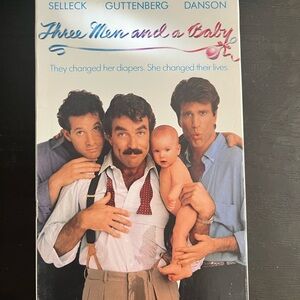 Three men and a baby